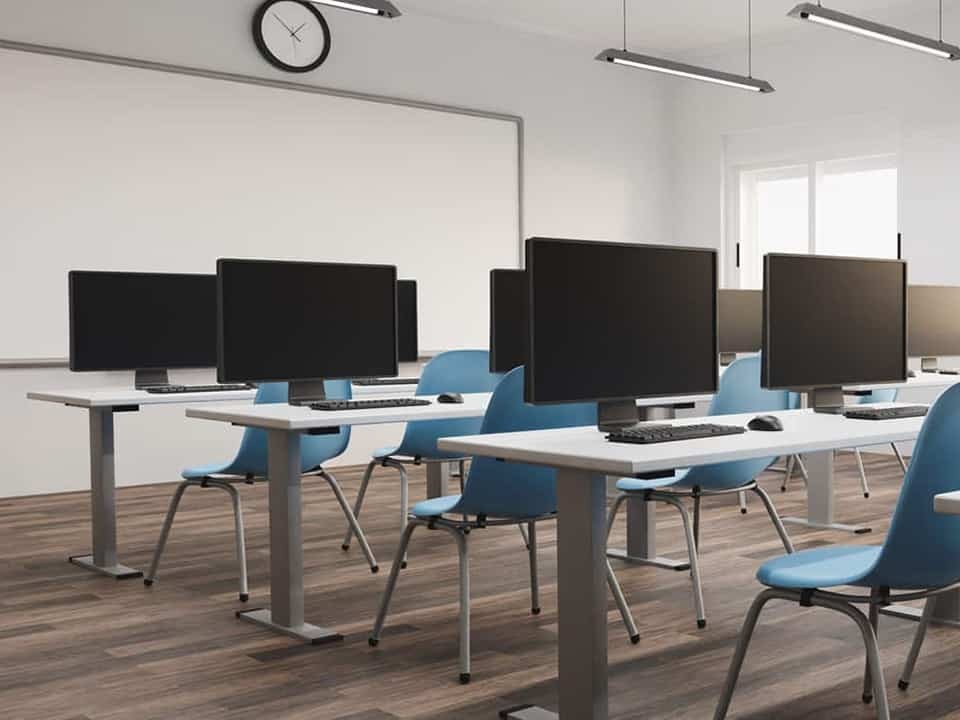 training room with desk and computers